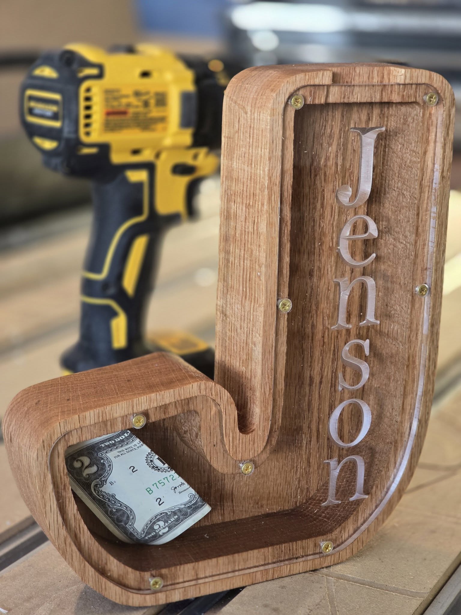 Wooden letter J piggy bank named Jenson